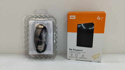 Внешний жесткий диск 2.5" 4Tb WD My Passport WDBPKJ0040BBK-WESN USB3.0 Черный УЦЕНКА